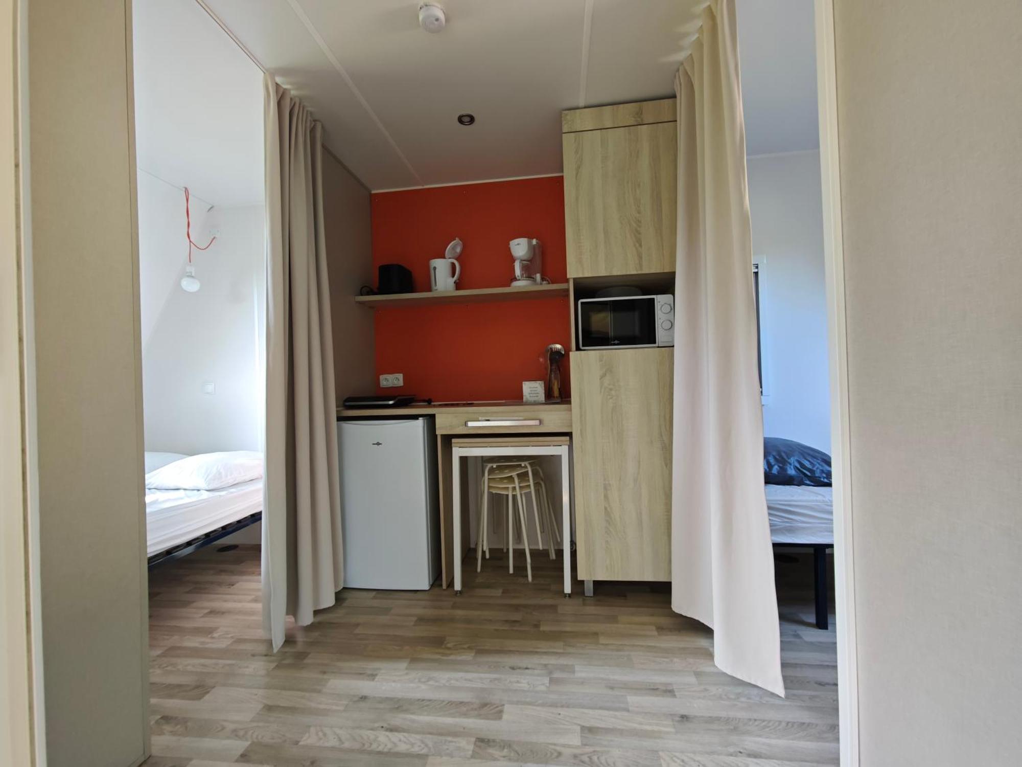Camping Le Val Aux Fees - Broceliande Concoret Habitación foto